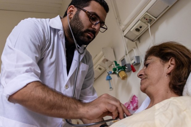 Patient receiving care at Damascus Hospital in Syria