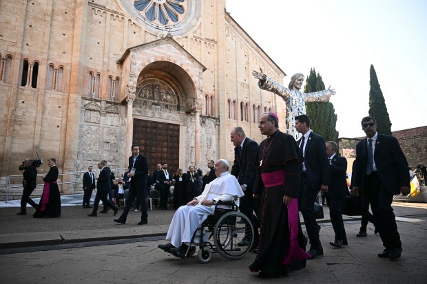 Pope Francis arrives at the Basilica of San Zeno during a visit in Verona, on May 18, 2024.