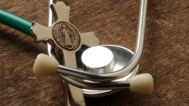 Cross with stethoscope