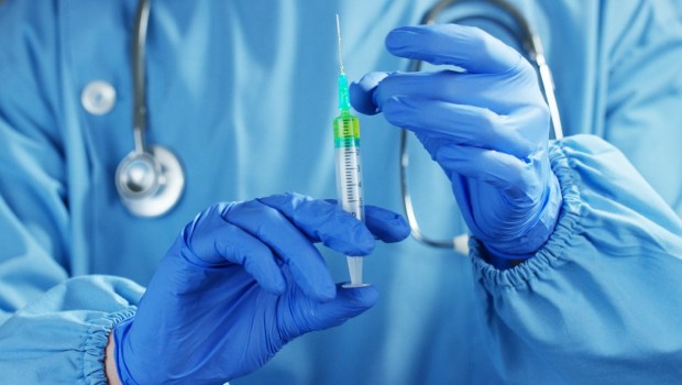 Doctor with needle
