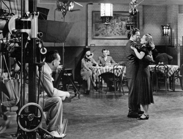 Spencer Tracy and Joan Crawford filming a scene for the 1938 film "Mannequin"