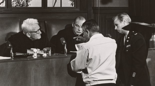 Spencer Tracy and Richard Widmark with director Stanley Kramer on the set of "Judgment at Nuremberg," 1961