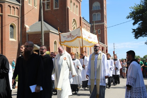 Monks of St. Benedict’s Abbey in Atchison, Kansas, walk with the Blessed Sacrament in Atchison as it enters Benedictine College’s campus. Benedictine College is a premiere sponsor of the National Eucharistic Congress, the ultimate destination of the pilgrimage.