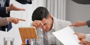 How should we react when a co-worker makes a mistake?