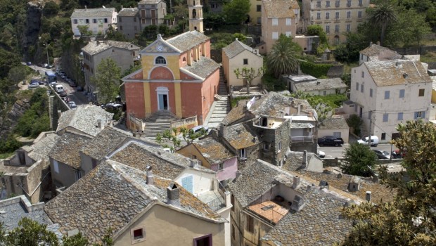 The village of Nonza in Corsica with a view of the Church of St. Julie