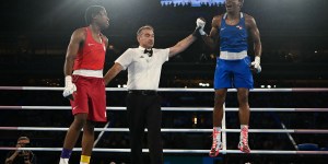 Refugee Olympic Team makes history with first medal