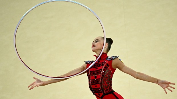 Ukraine's Taisiia Onofriichuk performs with the hoop as she competes in the rhytmic gymnastics' individual all-around final during the Paris 2024 Olympic Games